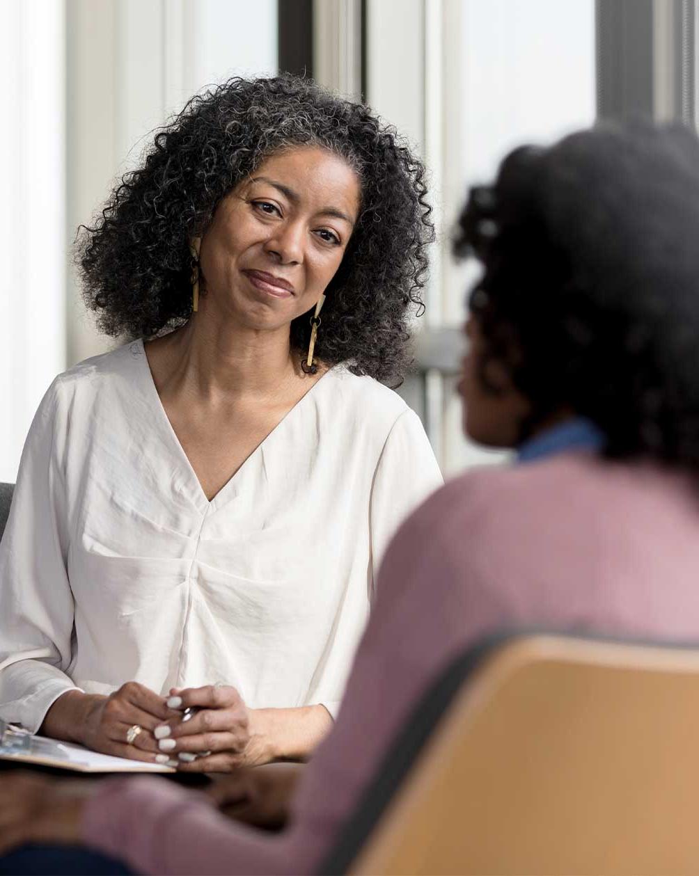 Two people in counseling session